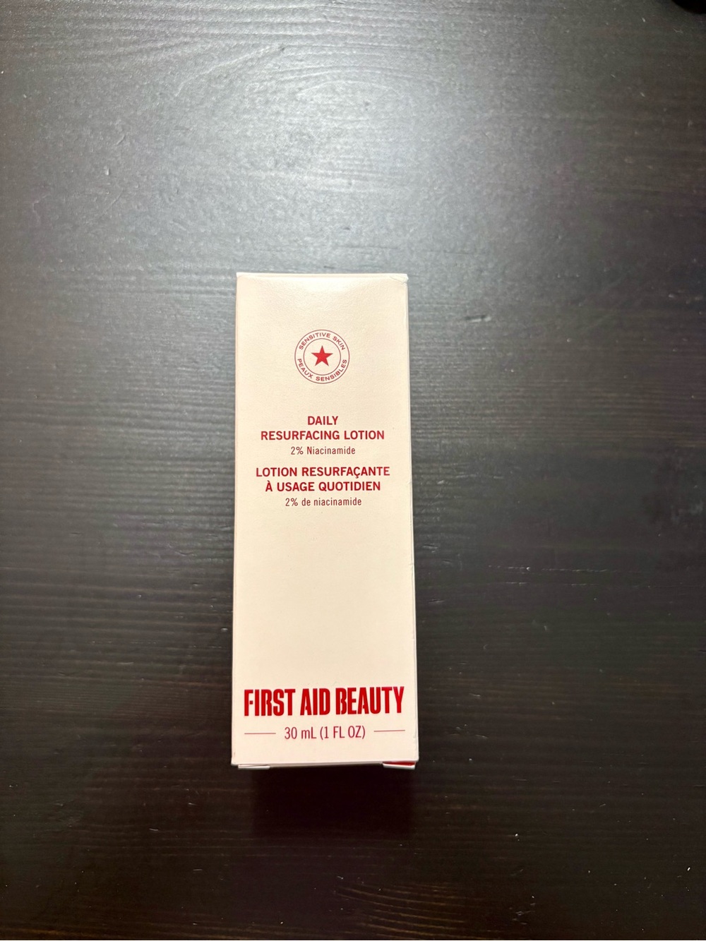 First Aid Beauty Daily Resurfacing Lotion – Pale Pink & Red Accents